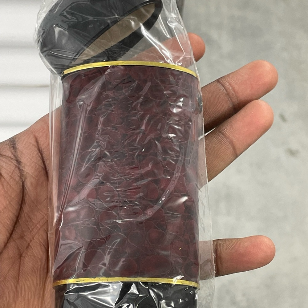 Red and Black Textured Bottle